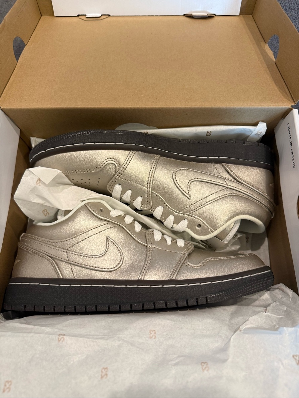 Nike Jordans women’s Metallic Silver Low-Top Sneakers